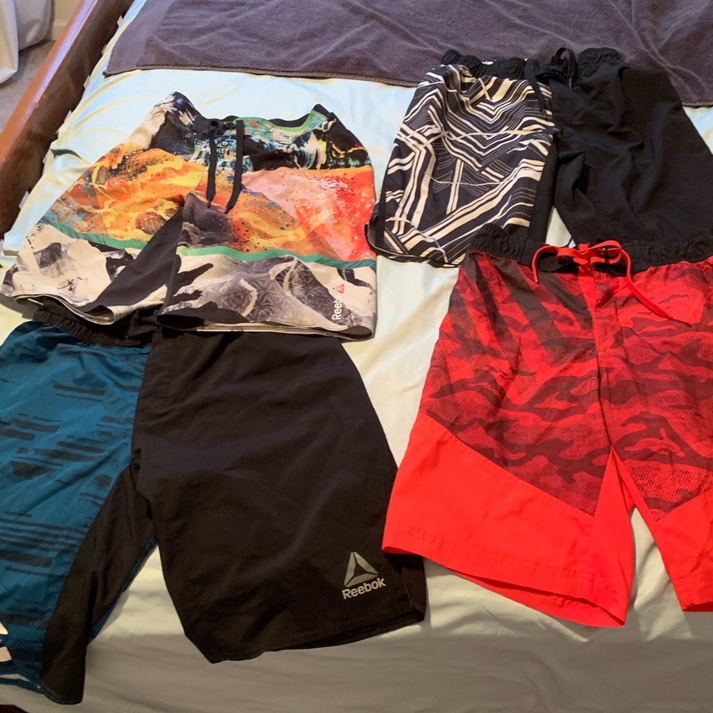 Four pairs of small Reebok Speedwick shorts used for CrossFit.